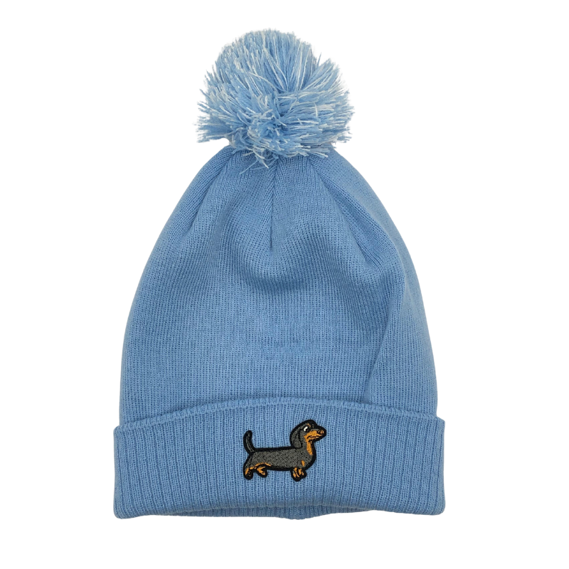 Strickmütze mit Bommel und gesticktem Dackelmotiv auf dem Umschlag, erhältlich in neun verschiedenen Farben.