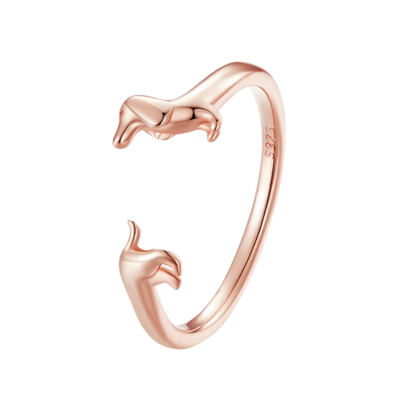 Verstellbarer Ring aus 925er Silber mit Dackel-Motiv, erhältlich in Silber, Schwarz und Roségold – zwei stilisierte Dackel schmiegen sich um den Finger und bilden die offene Ringspitze.
