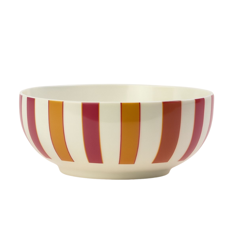Bunte Schale mit vertikalem Streifenmuster in Rot und Orange; auf der Innenseite befindet sich eine Illustration eines Dackels im gestreiften Pullover.