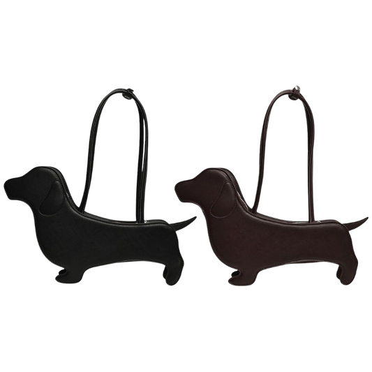 Handtasche in Form eines Dackels mit Tragehenkeln, stilvoll und witzig zugleich.