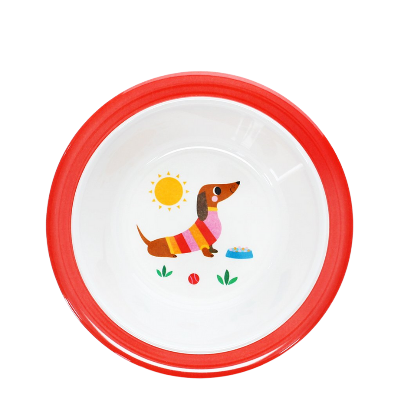 Weiße Melaminschüssel mit rotem Rand, innen ein fröhlicher Dackel im bunten Pullover, Sonne, Futternapf, Ball und Pflanzenmotiv.