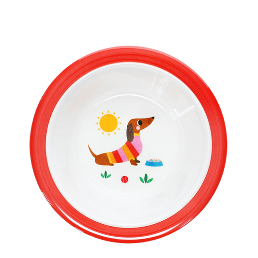 Weiße Melaminschüssel mit rotem Rand, innen ein fröhlicher Dackel im bunten Pullover, Sonne, Futternapf, Ball und Pflanzenmotiv.