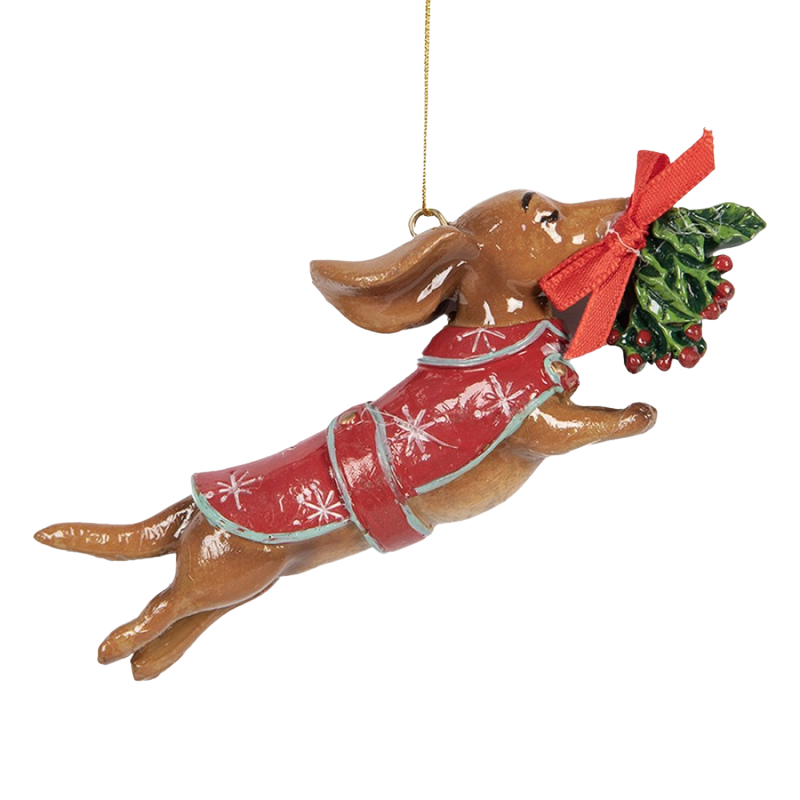 Weihnachtsanhänger eines fliegenden Dackels mit rotem Mantel und Mistelzweig im Maul.
