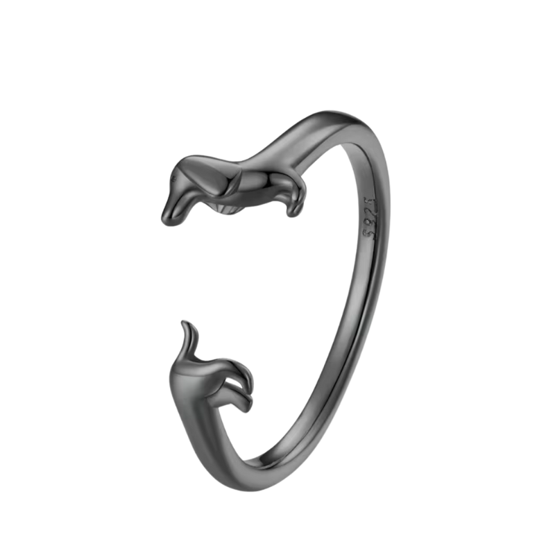Verstellbarer Ring aus 925er Silber mit Dackel-Motiv, erhältlich in Silber, Schwarz und Roségold – zwei stilisierte Dackel schmiegen sich um den Finger und bilden die offene Ringspitze.