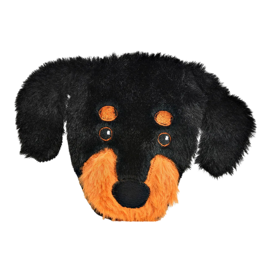 Plüschiger Taschenwärmer in Form eines Dackelkopfes mit schwarzem Fell und braunen Details, inklusive rotem Wärmekissen im Inneren.