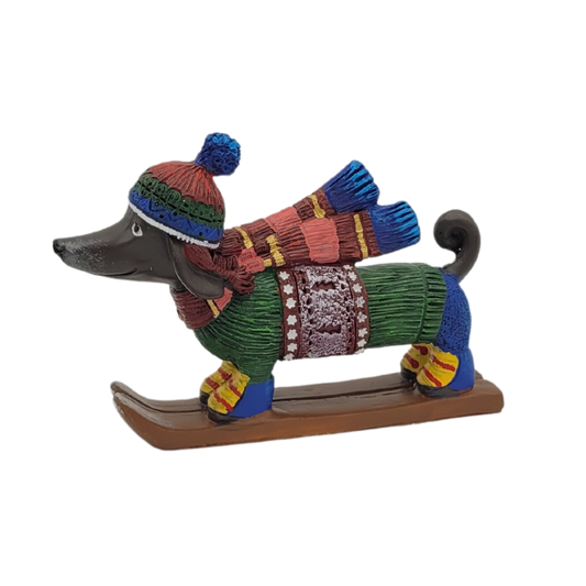 Weihnachtsdekorationsfigur Dackel auf Skier